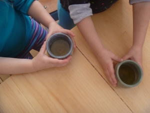 Tiny little pots of tea for each child.