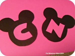 If you did not print on card stock use printed ears as template on actual card stock 