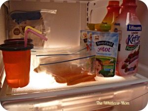 Create an easy-to-reach snack shelf in the fridge for fresh snacks.