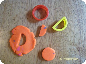 Cut out letters from play dough 