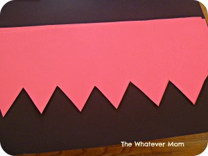 Cut poster board in half and cut triangles for hairline.